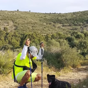 Walking with walking poles with a pet